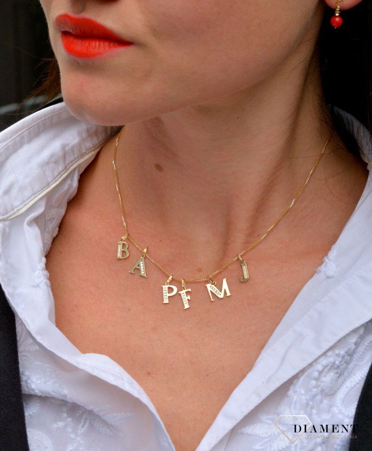 Złota zawieszka w kształcie literki F wykonana z wysokiej próby złota 585..jpg