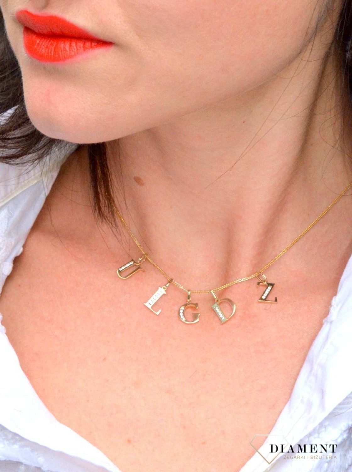 Złota zawieszka w kształcie literki L wykonana z wysokiej próby złota 585..jpg