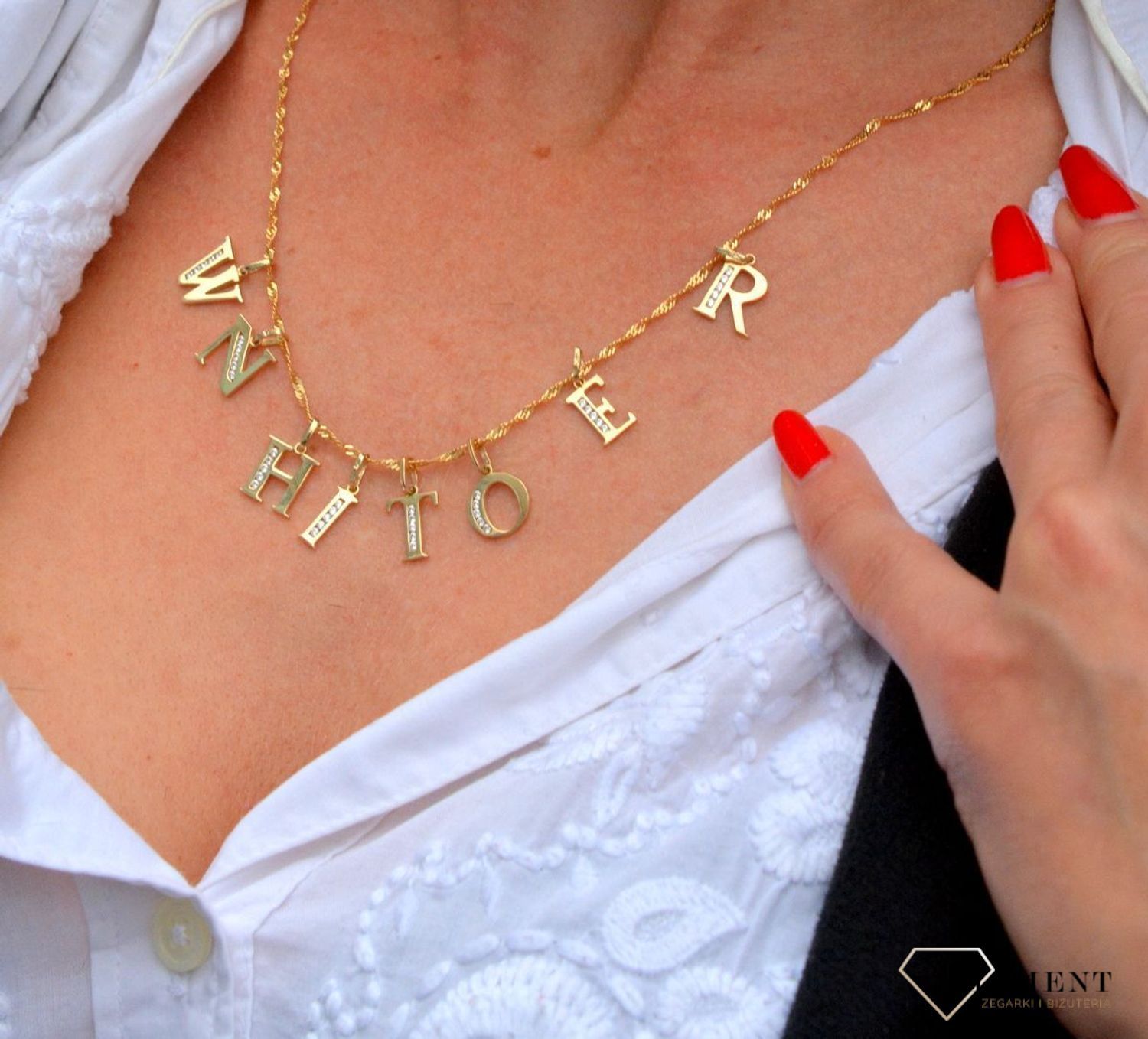 Złota zawieszka w kształcie literki O wykonana z wysokiej próby złota 585..jpg