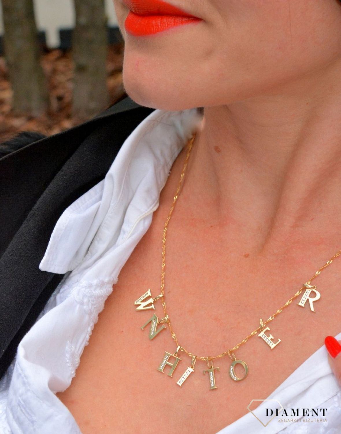 Złota zawieszka w kształcie literki R wykonana z wysokiej próby złota 585..jpg