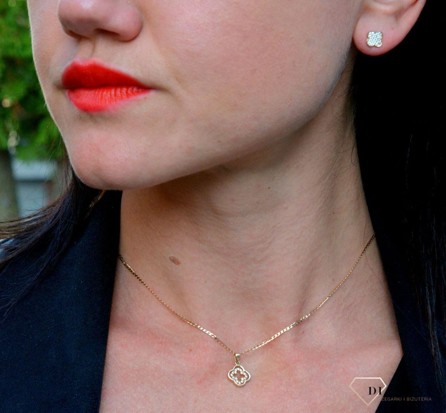 Złota zawieszka koniczynka z błyszczącą białą cyrkonią DIA-ZAW-4282-585.jpg
