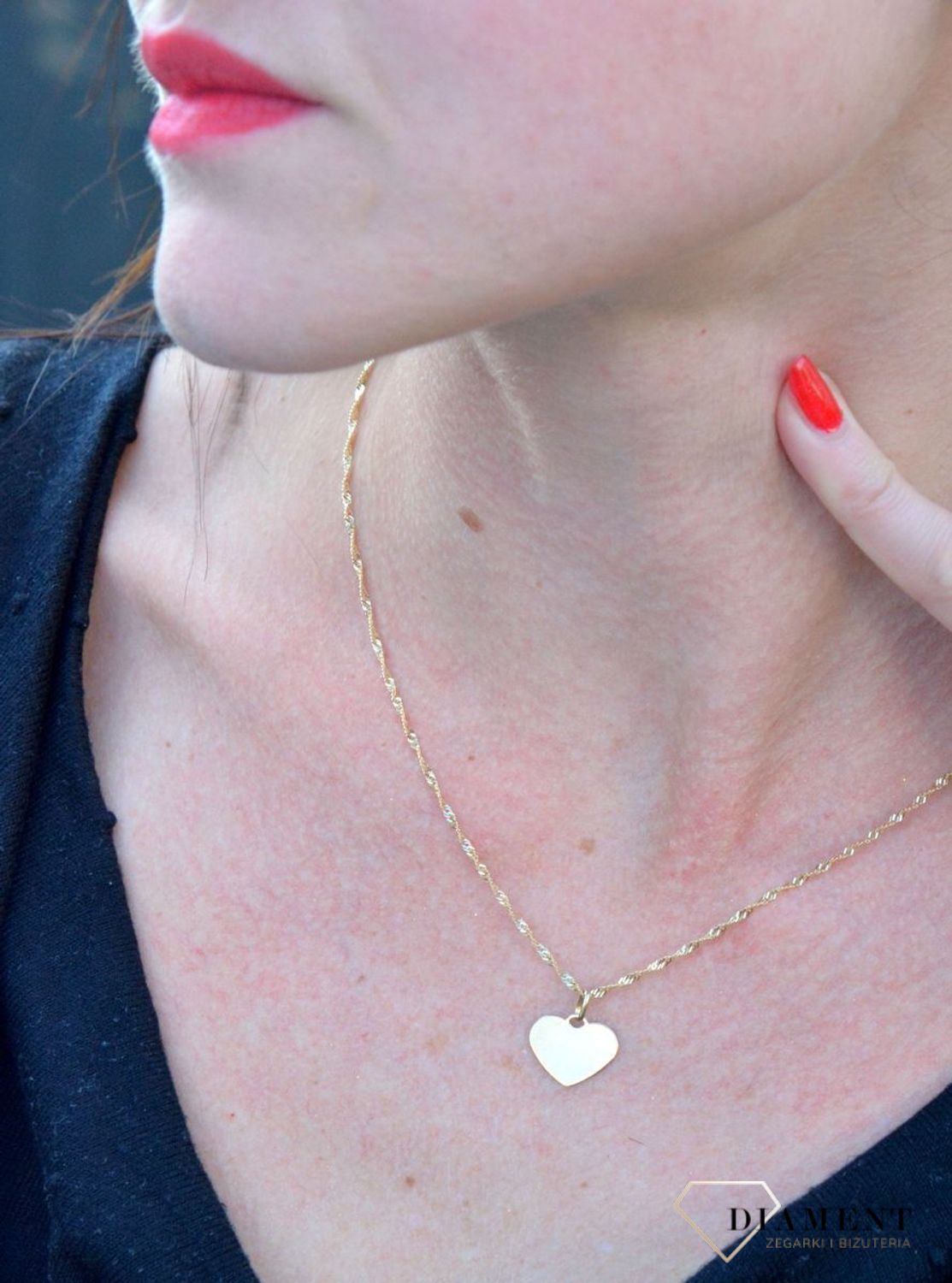 Złota zawieszka blaszka gładkie serce DIA-ZAW-4388-585. Złota zawieszka w kształcie serca gładkie.jpg