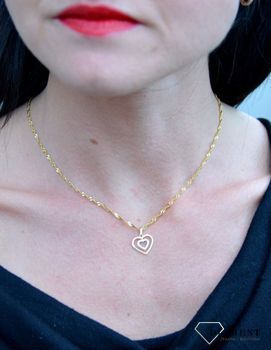 Złota zawieszka podwójne serce z białym złotem DIA-ZAW-4389-585. Złota zawieszka w kształcie grawerowanego serca z ozdobnym wzorem.  (1).JPG
