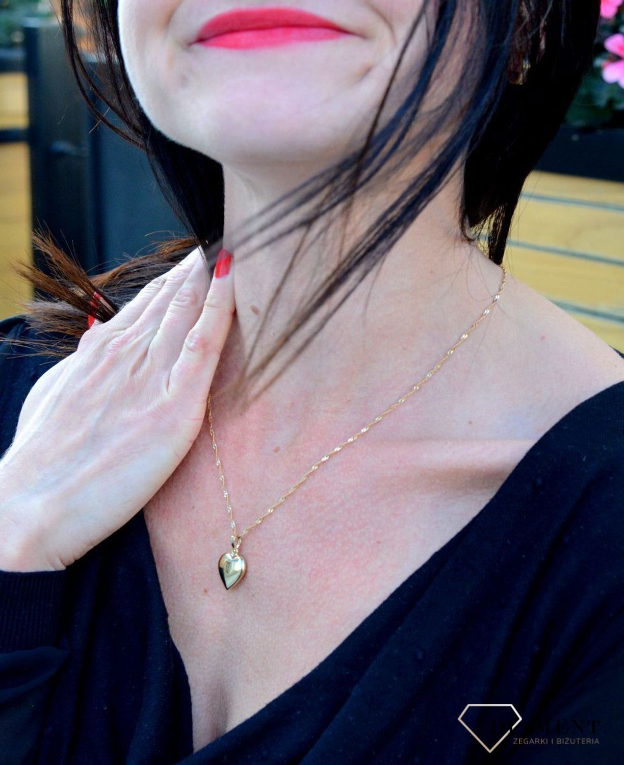 Złota zawieszka wypukłe, gładkie serce DIA-ZAW-4391-585. Zawieszka w formie wypukłego serca o gładkiej powierzchni.jpg