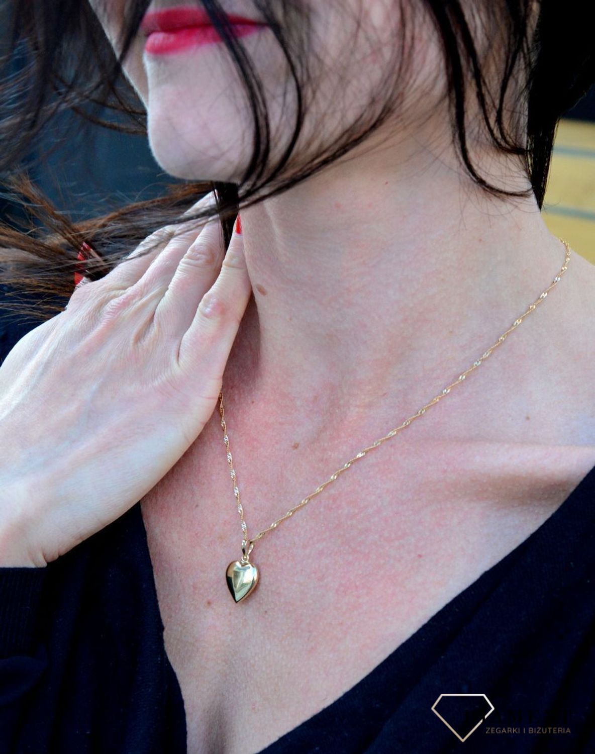 Złota zawieszka wypukłe, gładkie serce DIA-ZAW-4391-585. Zawieszka w formie wypukłego serca o gładkiej powierzchni.jpg