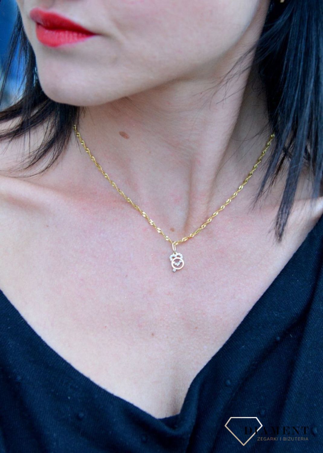 Złota zawieszka serce z cyrkonią i pierścionek DIA-ZAW-4399-585. Złota zawieszka w kształcie serca ozdobionego cyrkonią i pierścionek.jpg