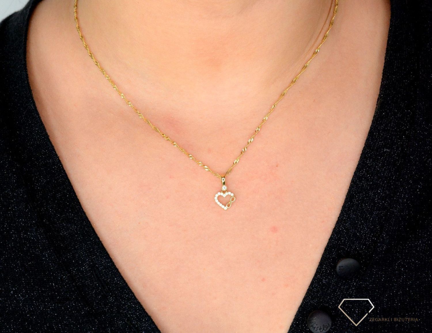Złota zawieszka w kształcie serca ozdobionego cyrkonią oraz znak nieskończoności DIA-ZAW-4432-585.jpg