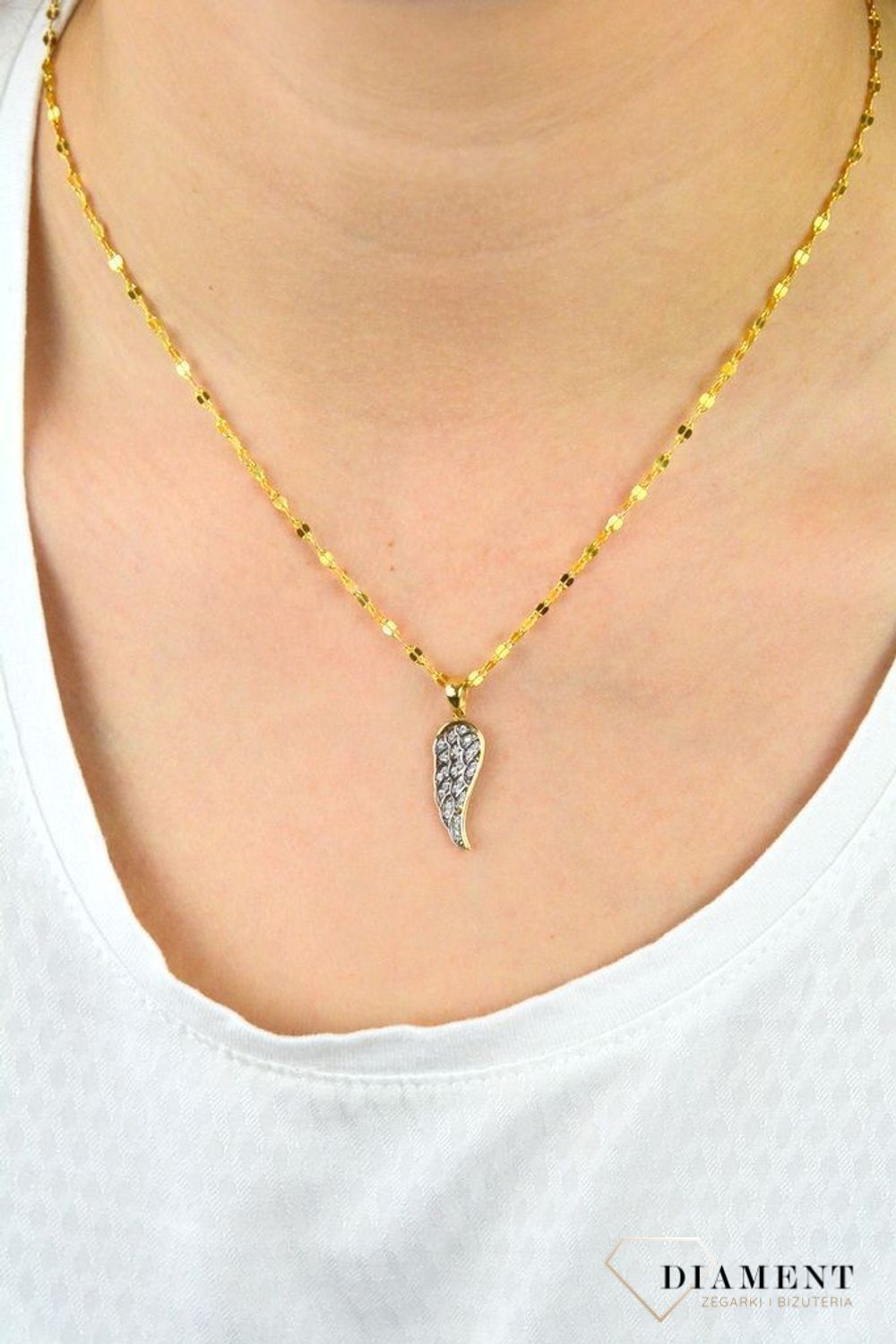 Złota zawieszka skrzydło ozdobione białą cyrkonia DIA-ZAW-5259-585.jpg