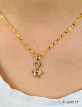 Złota zawieszka 585 serce z dwoma aniołkami DIA-ZAW-5261-585. Złota zawieszka 585 w kształcie serduszka z dwoma aniołkami białe oraz żółte złoto (1).JPG