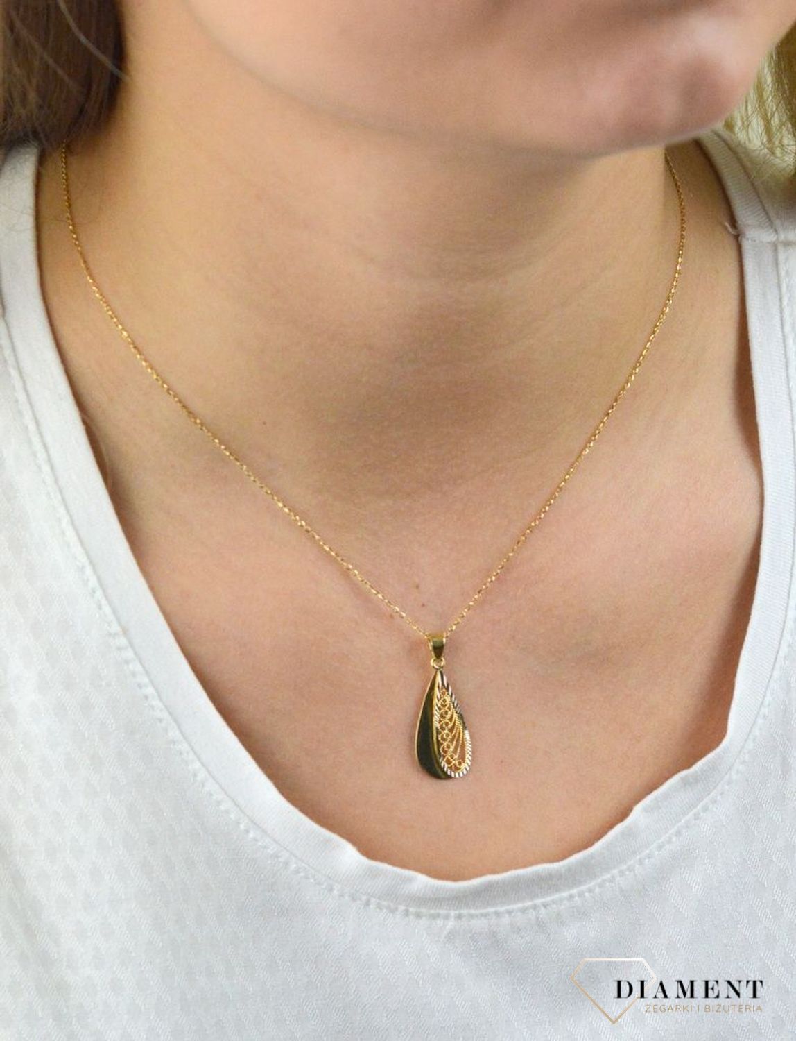 Złota zawieszka owalna ażurowa z białym złotem DIA-ZAW-5267-585.jpg