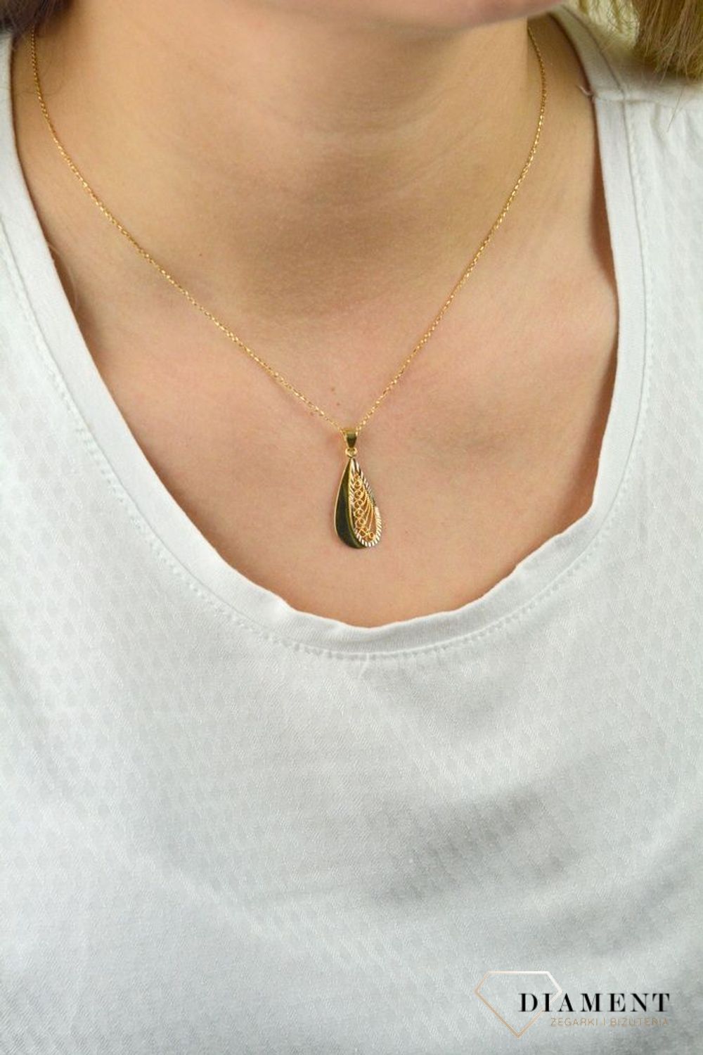 Złota zawieszka owalna ażurowa z białym złotem DIA-ZAW-5267-585.jpg