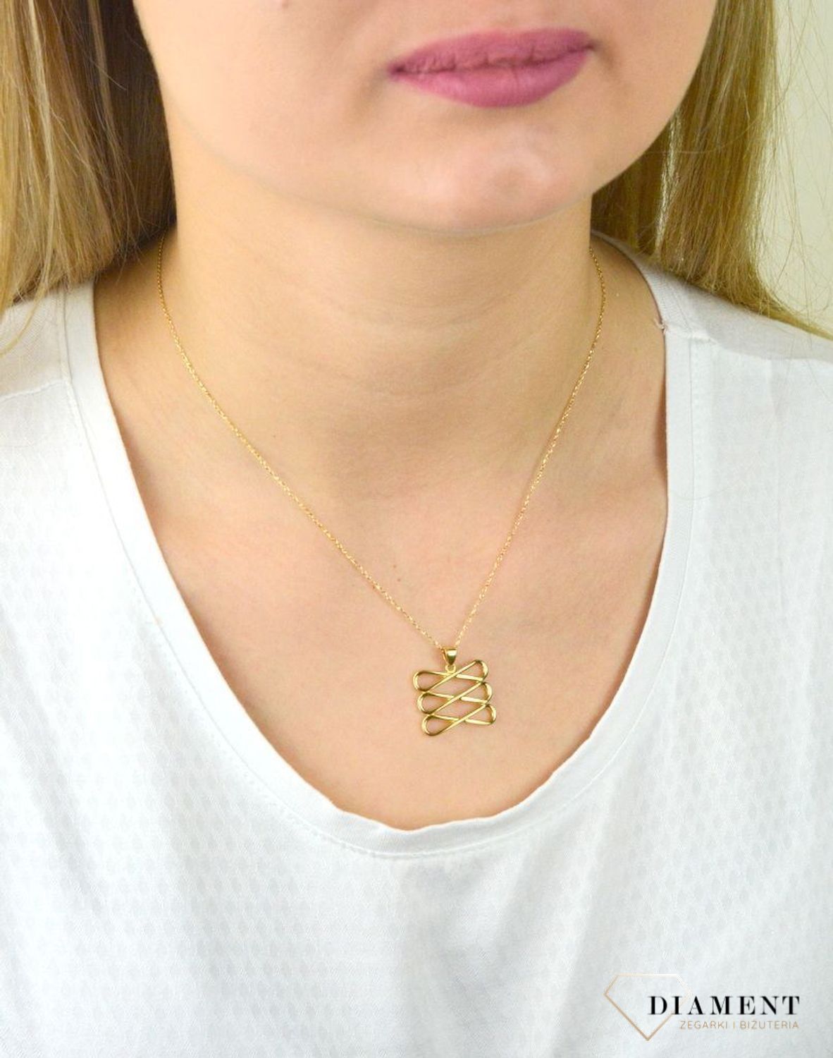 Złota zawieszka ażurowa znaki nieskończoności DIA-ZAW-5276-585.jpg