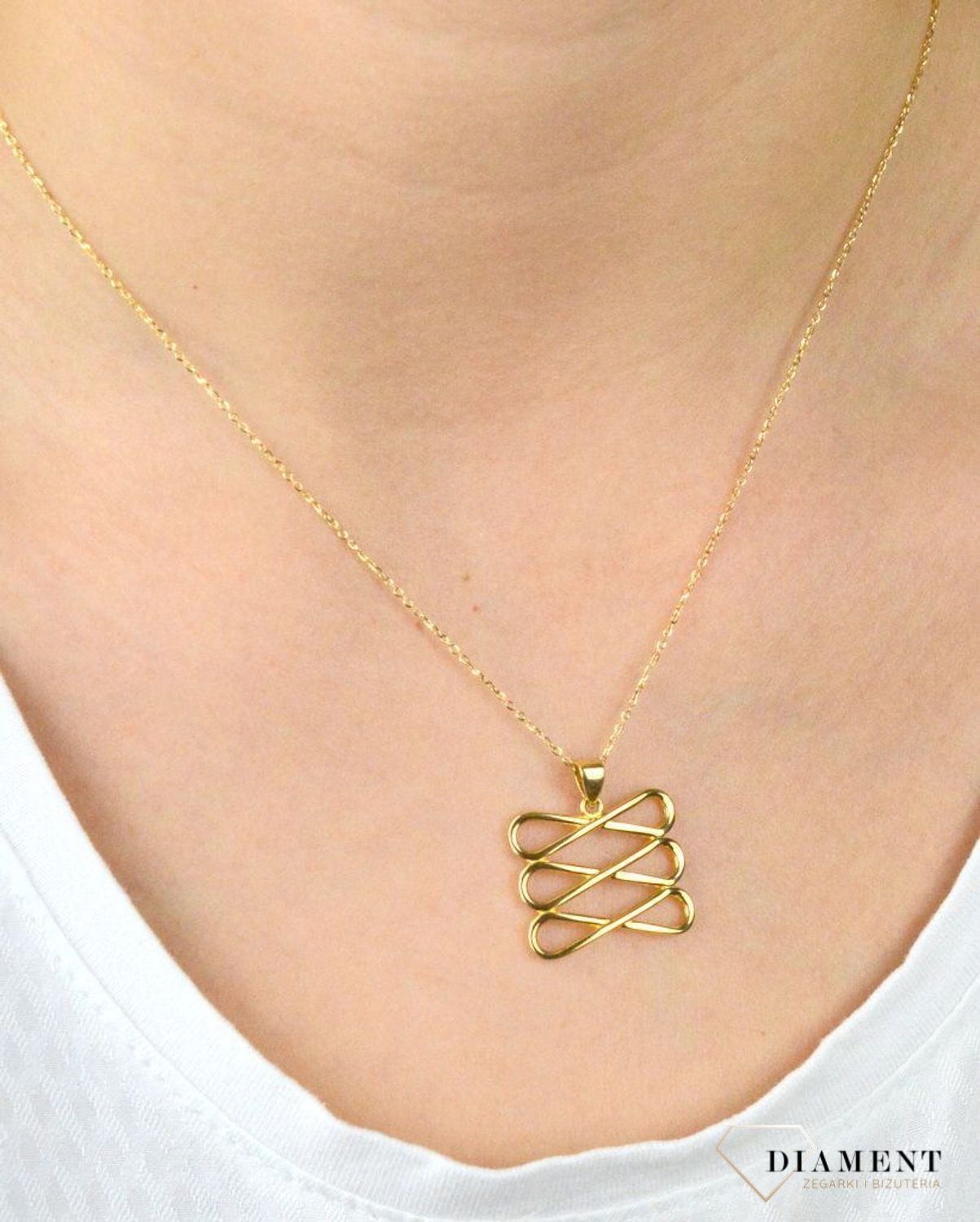Złota zawieszka ażurowa znaki nieskończoności DIA-ZAW-5276-585.jpg