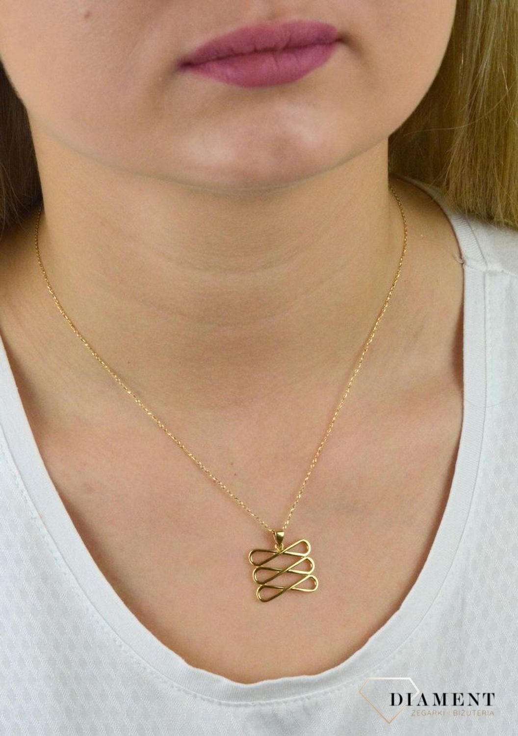 Złota zawieszka ażurowa znaki nieskończoności DIA-ZAW-5276-585.jpg