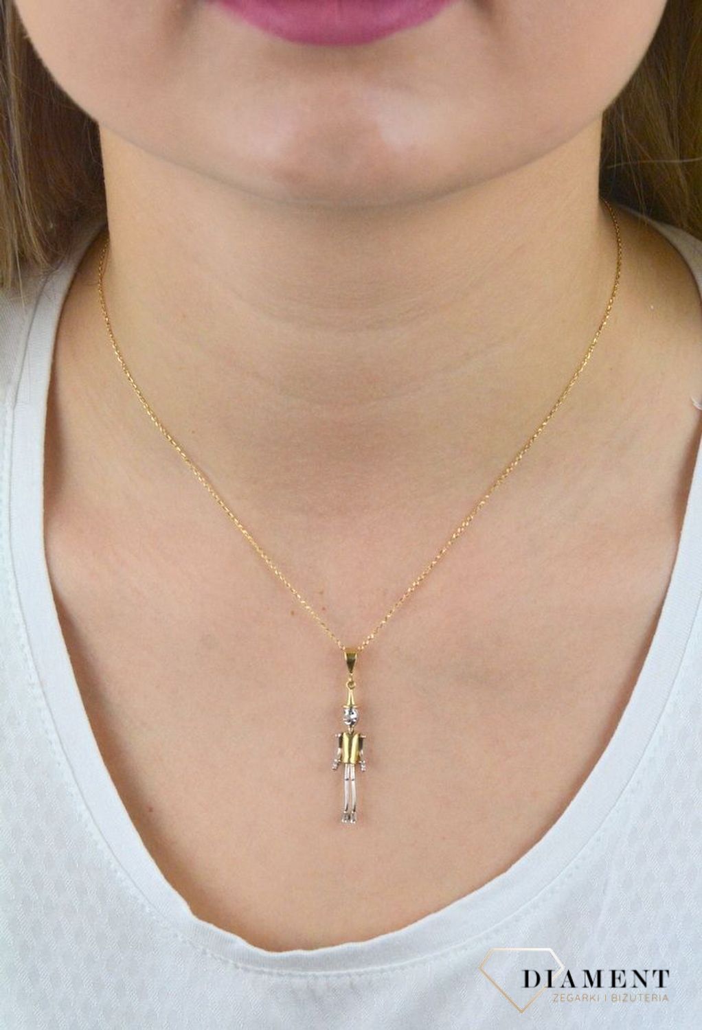 Złota zawieszka ruchomy Pinokio DIA-ZAW-5280-585.jpg