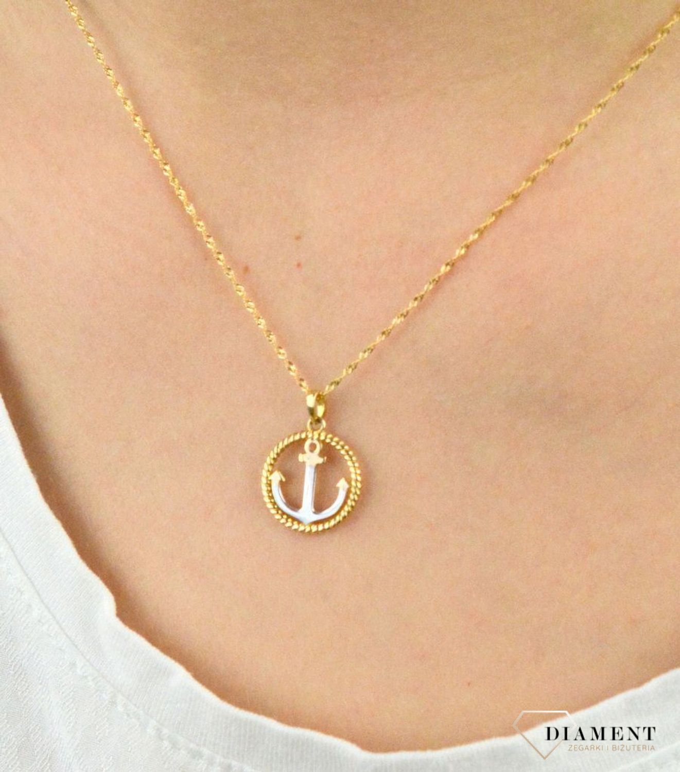 Złota zawieszka okrągła zawieszka z kotwicą DIA-ZAW-5287-585.jpg