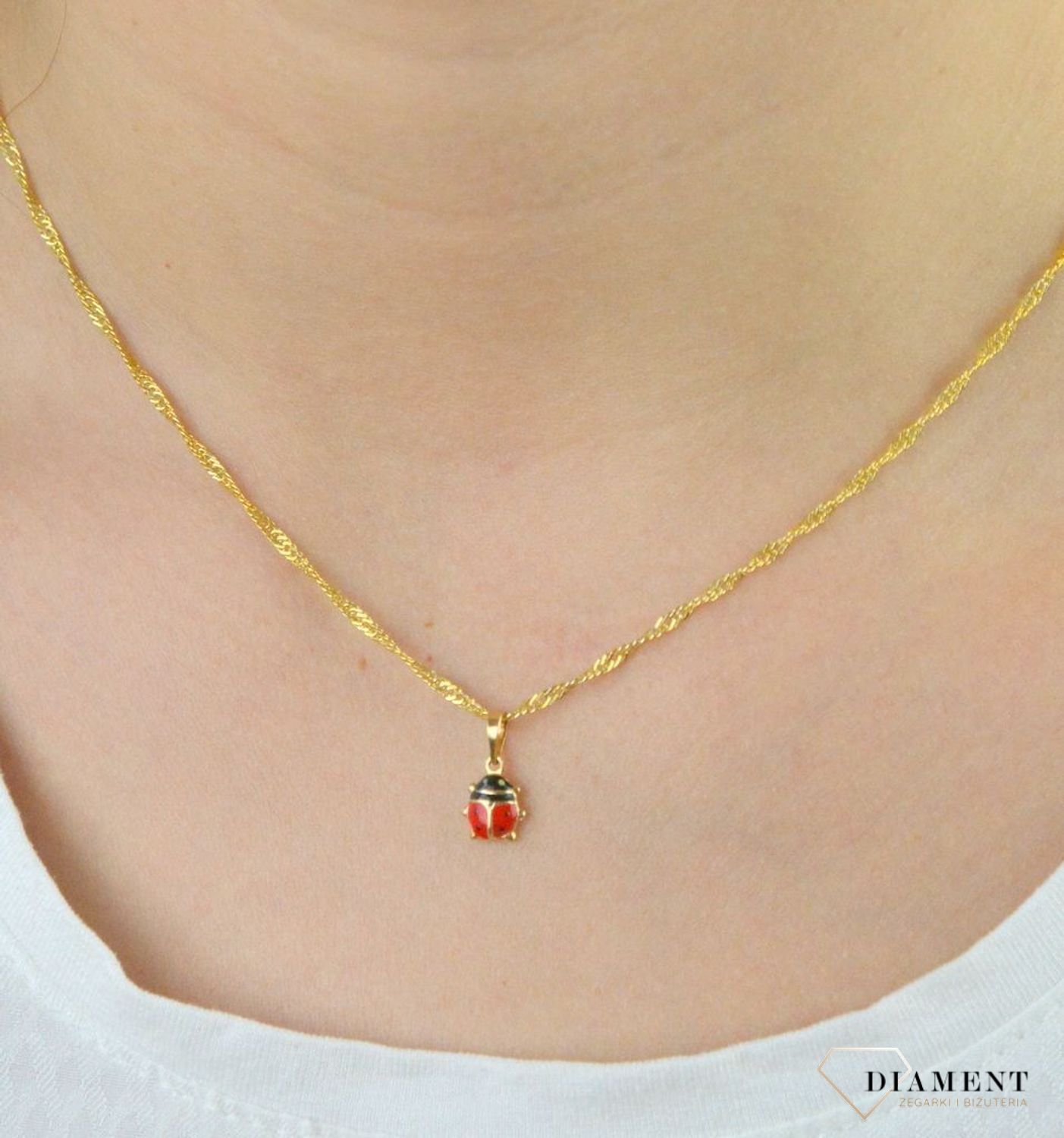 Złota zawieszka dla dziewczynki 'Czerwona biedronka' DIA-ZAW-5294-585.jpg