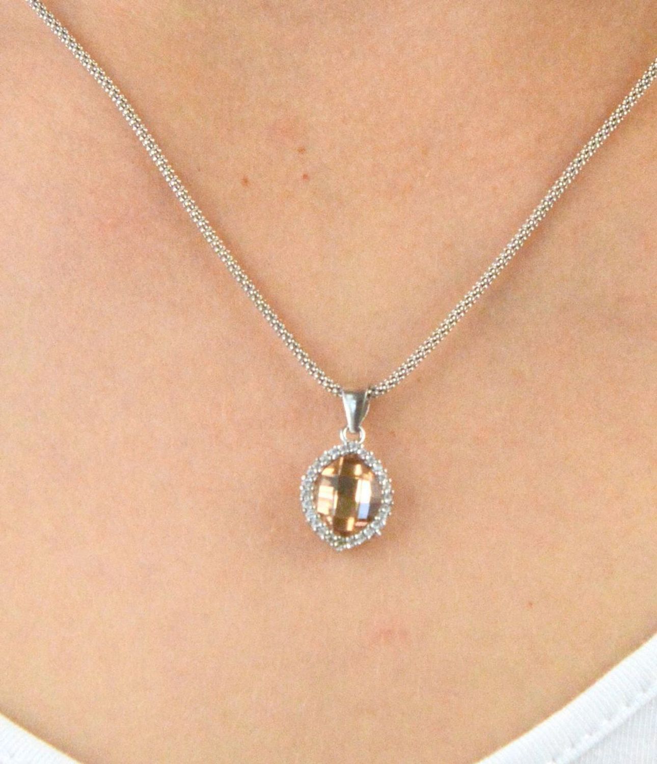 Zawieszka srebrna łososiowa z cyrkoniami DIA-ZAW-6086-925. Zawieszka srebrna z cyrkoniami. Zawieszka srebrna owalna. Zawieszka idealna na prezent..jpg