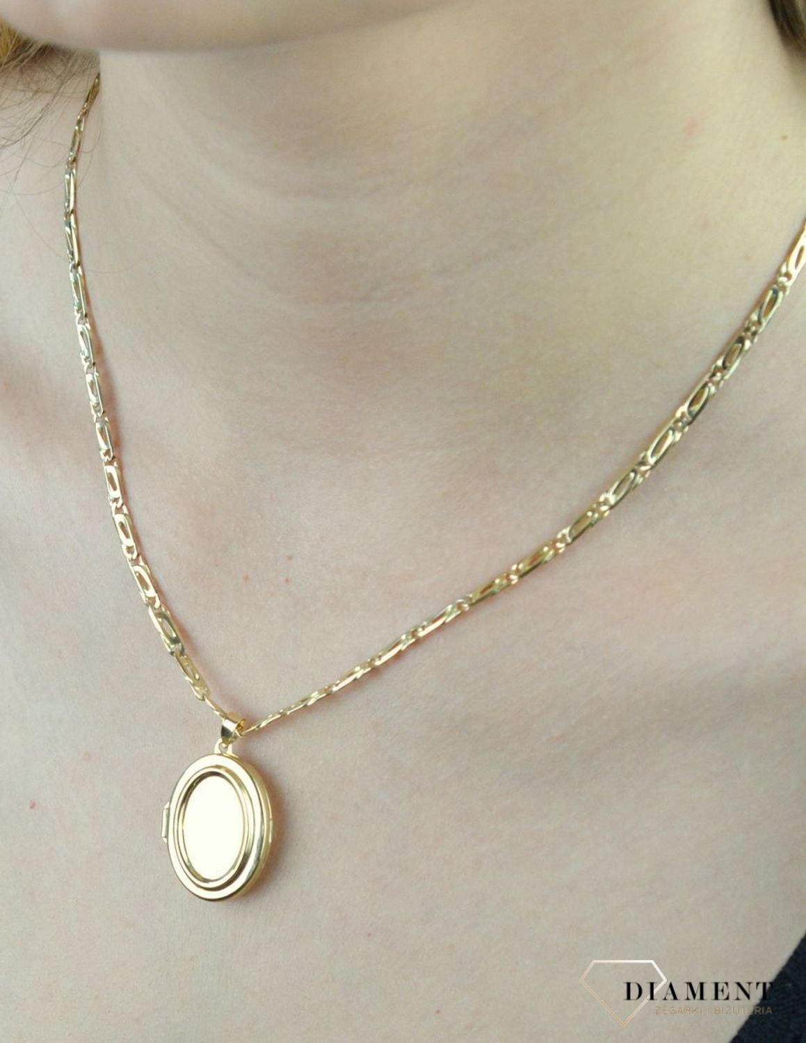 Złota zawieszka 585 owalne puzderko DIA-ZAW-6238-585.jpg