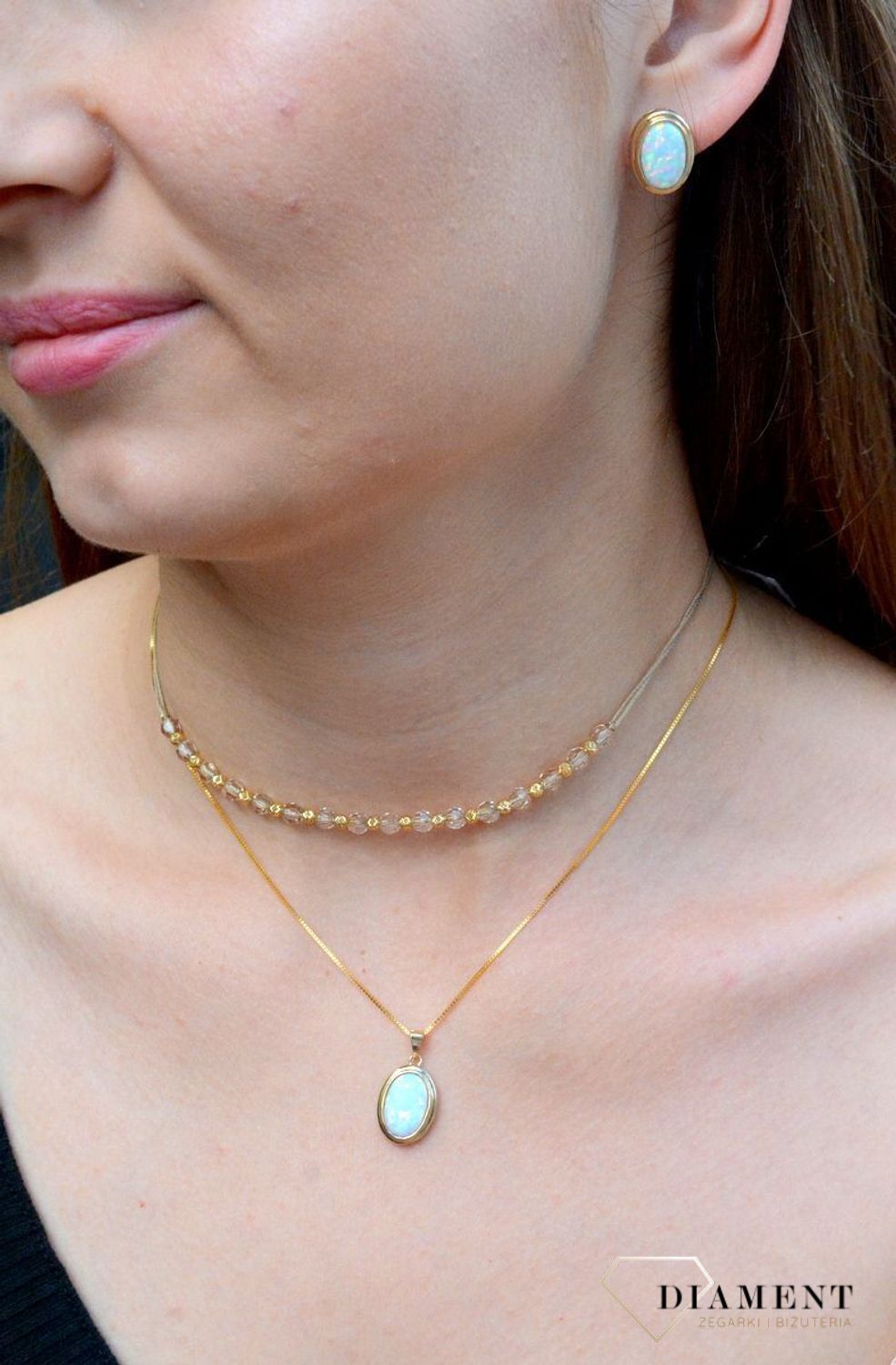 Złota zawieszka owalna z opalem DIA-ZAW-6239-585. Złota zawieszka z opalem. Złota zawieszka owalna. Złota zawieszka z białym kamieniem. Złota zawieszka damska. Złota.jpg