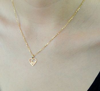 Złota zawieszka serce próby 585 DIA-ZAW-6245-585. Złota zawieszka w kształcie serca ozdobiona małymi sercami w środku. Elegancki wisiorek dla wyjątkowej kobiet (2).JPG
