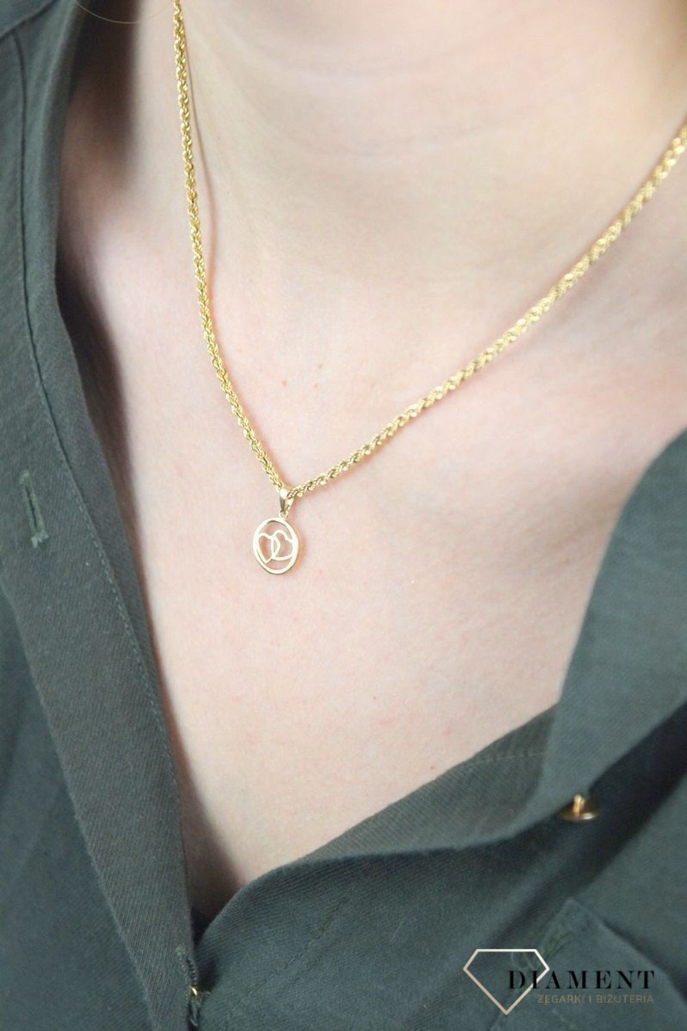 Złota zawieszka 585 serduszka w kółeczku DIA-ZAW-6246-585 to klasyczny element biżuterii mogącej pięknie ozdobić każdy kobiecy dekolt. To dodatek, który nie tylko pozwala uatrakcyjnić wizerunek, ale także w ciągu kilku chwil.jpg