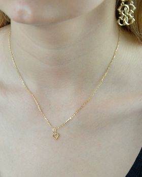 Zawieszka złote serduszko z kuleczek  DIA-ZAW-6248-585 Złota zawieszka w kształcie serca z delikatnych kuleczek. Elegancki wisiorek wykonany z najwyższej jakości 14 –karatowego żółtego złota. Ta unikalna biżuteria, (1).JPG