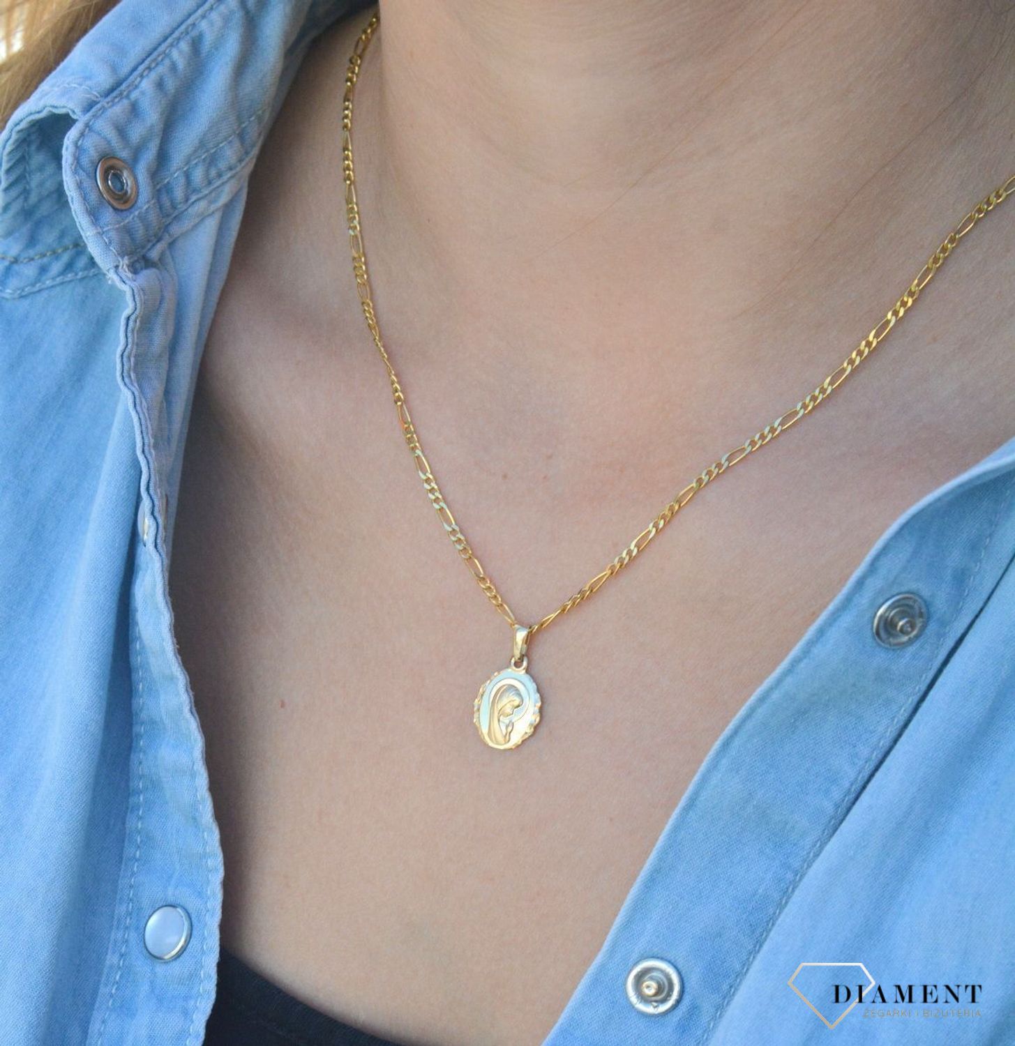 Złota zawieszka medalik 585 z Matką Boską DIA-ZAW-6264-585. Złota zawieszka medalik 585 'Matka Boska'. Złoty medalik został wykonany z najwyższej jakości 14 – karatowego żółtego złota. Idealnie się sprawdzi jako prezent. Złot.jpg