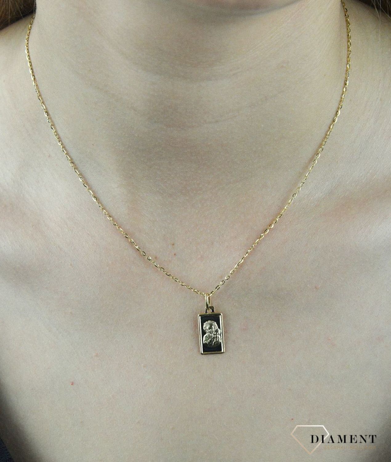 Złota zawieszka 585 medalik z Matka Boska Częstochowska DIA-ZAW-6265-585.Biżuteria sprawdzi się idealnie jako prezent i upamiętnieni.jpg