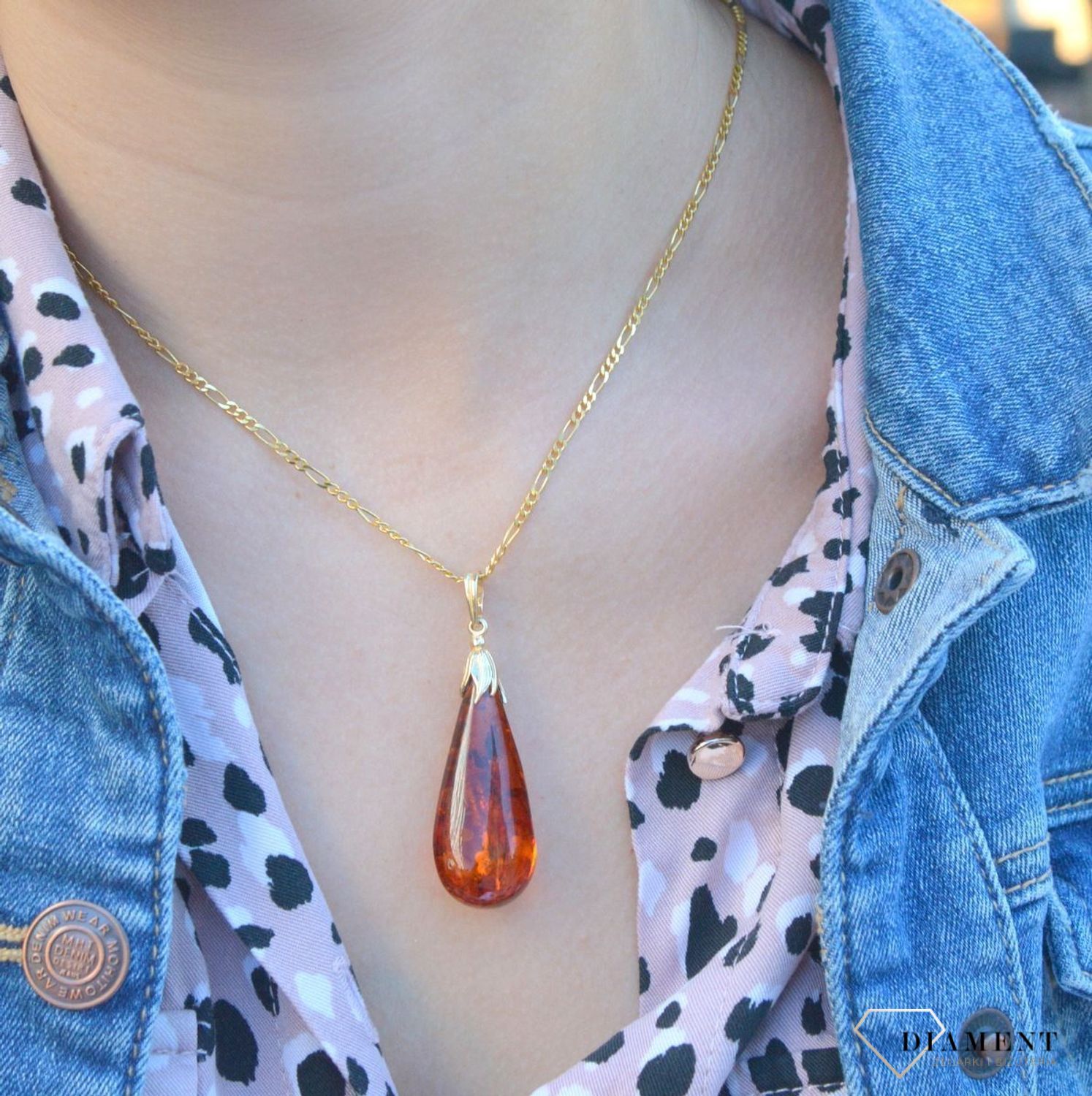 Złota zawieszka 585 z bursztynem bałtyckim sopelek DIA-ZAW-6995-585.   Złota zawieszka z bursztynem bałtyckim. Złota zawieszka z bursztynem. Złota zawieszka idealna na prezent. Złota zawieszka z bursztynem na prezent dla mamy,.jpg