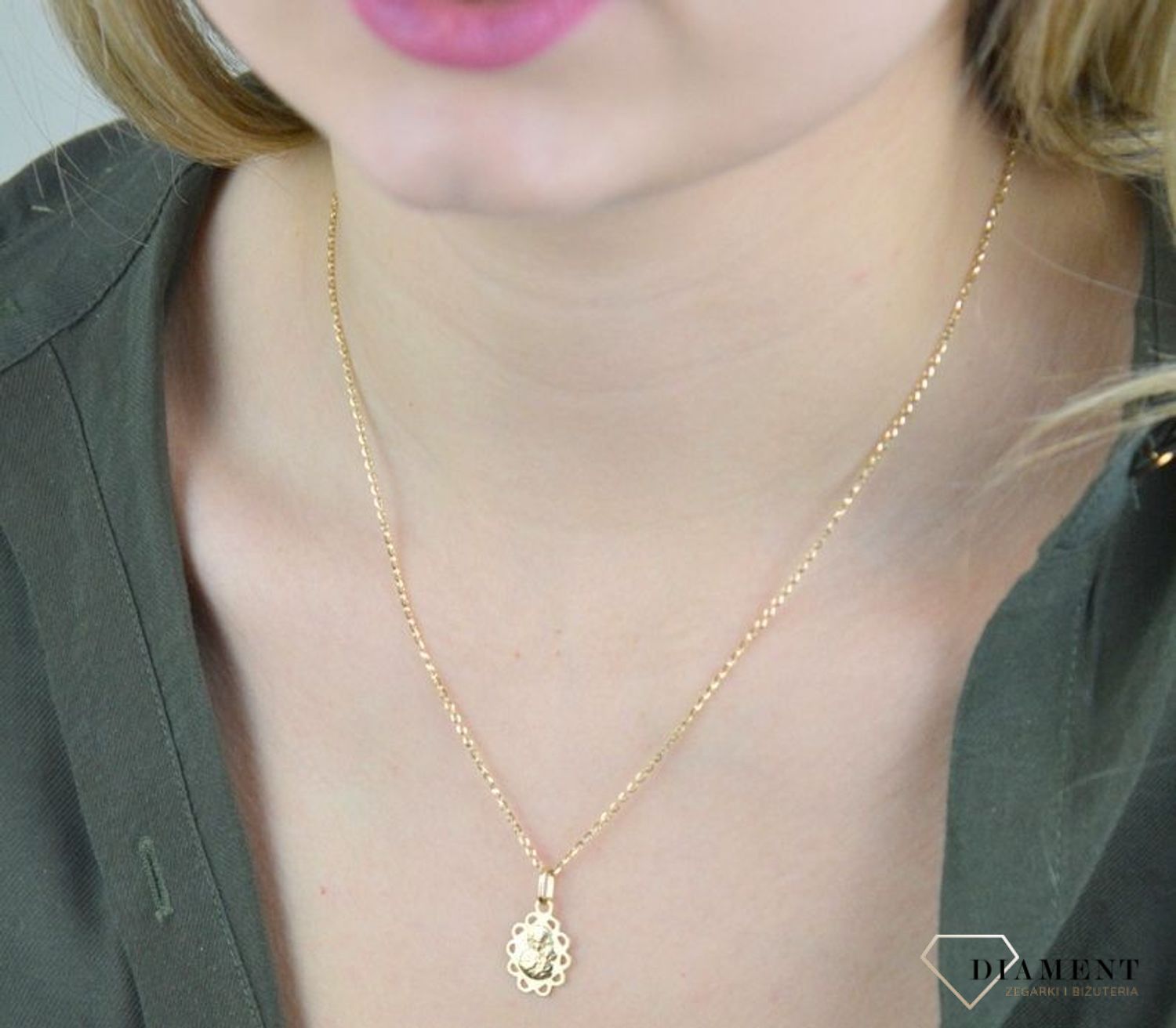 Złota zawieszka medalik 585 z Matką Boską Częstochowską DIA-ZAW-8597-585. Złota zawieszka medalik 585 z Matką Boską Częstochowską. Złoty medalik został wykonany z najwyższej jakości 14 – karatowego żółtego złota. Delikatny wisio.jpg