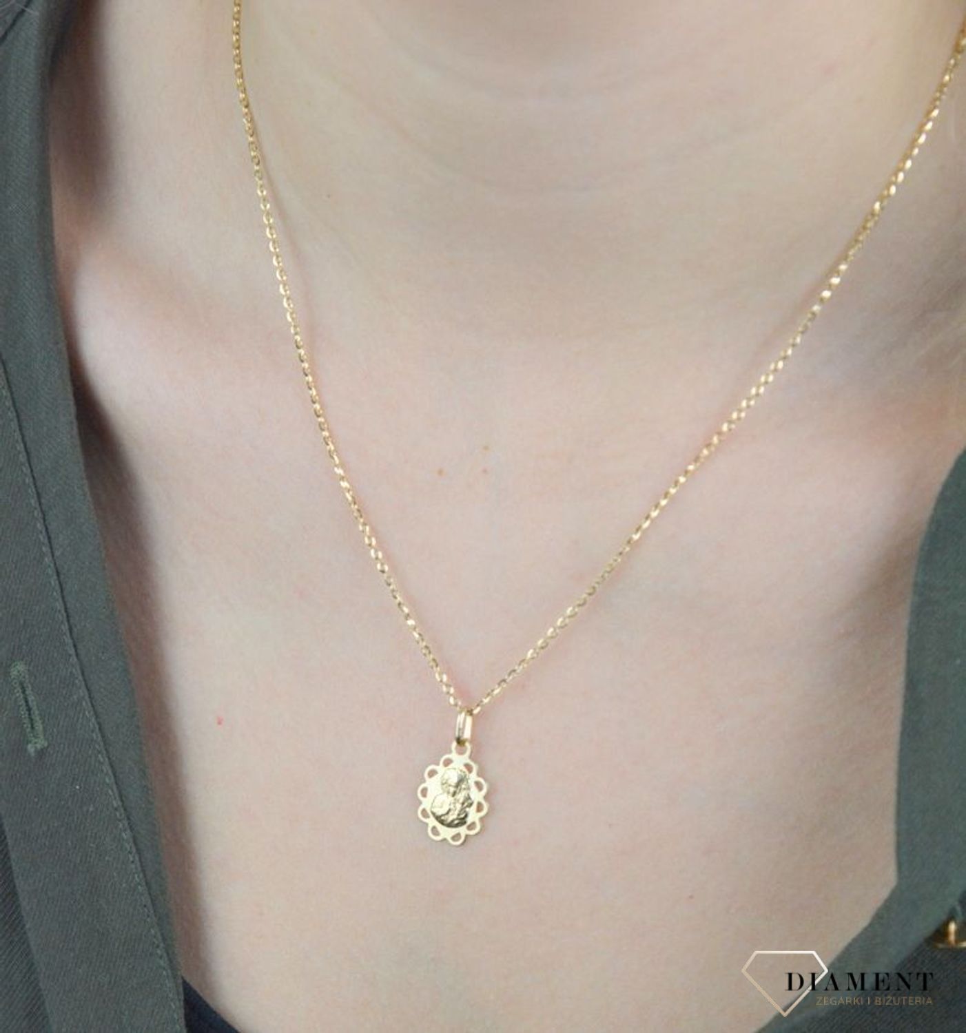 Złota zawieszka medalik 585 z Matką Boską Częstochowską DIA-ZAW-8597-585. Złota zawieszka medalik 585 z Matką Boską Częstochowską. Złoty medalik został wykonany z najwyższej jakości 14 – karatowego żółtego złota. Delikatny wisio.jpg