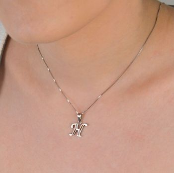 Zawieszka srebrna próba 925, Literka H zdobiona cyrkoniami DIA-ZAW-8673-H-925 Zawieszka w kształcie literki „H” ozdobiona cyrkoniami to elegancka biżuteria wykonana z wysokiej jakości srebra próby 925 (2).JPG