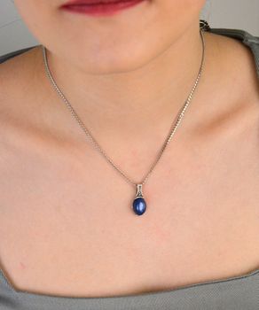 Zawieszka srebrna owalna z masą jubilerską niebieską próba 925, DIA-ZAW-8696-925.Elegancka zawieszka srebrna o owalnym kształcie, wypełniona niebieską masą jubilerską, wykonana z wysokiej jakości sr.JPG