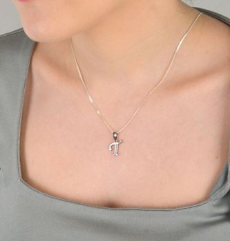 Zawieszka srebrna próba 925, literka T zdobiona cyrkoniami DIA-ZAW-8748-T-925 Piękna zawieszka w kształcie literki T, wykonana z najwyższej jakości srebra próby 925 i ozdobiona lśniącymi cyrkoniami (3).JPG