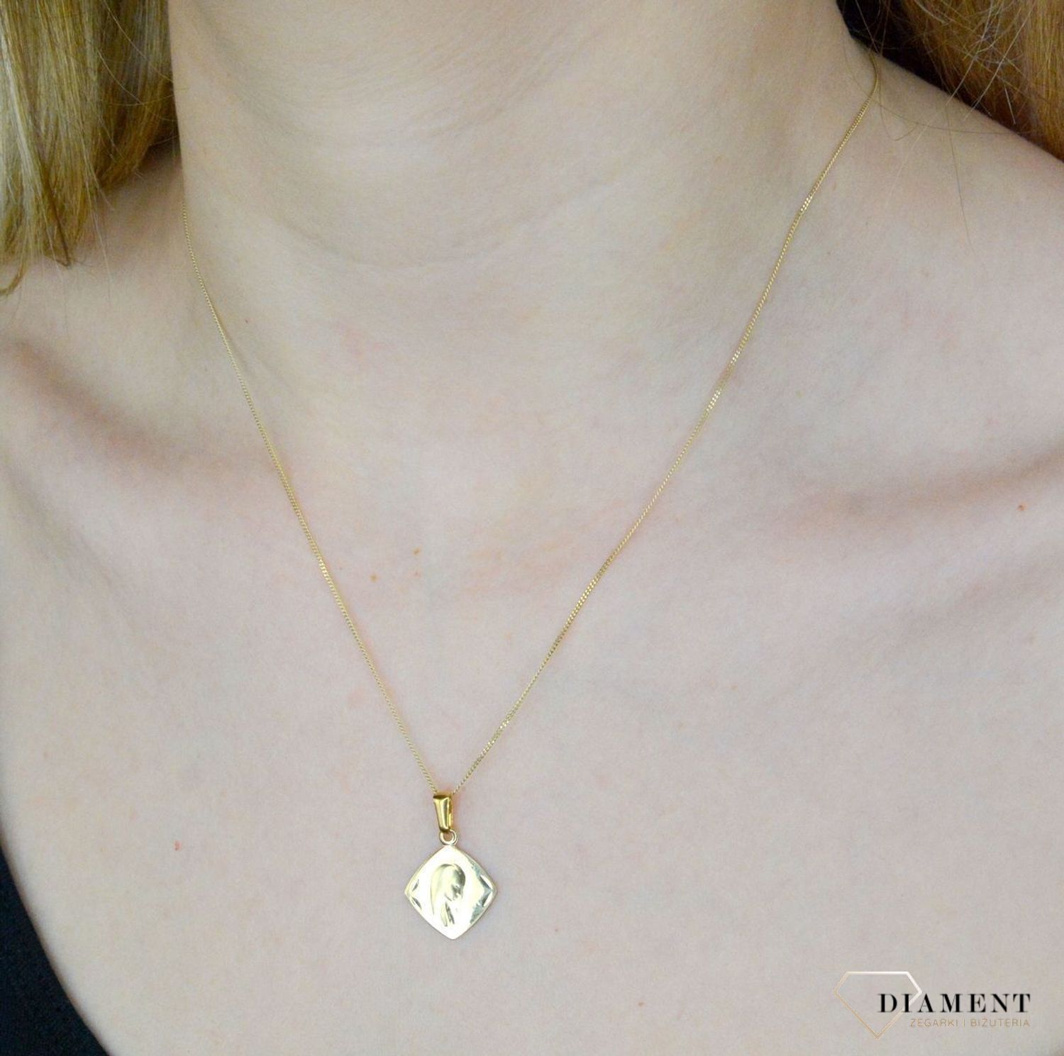 Złota zawieszka 585 z Matką Boską DIA-ZAW-9026-585. Medalik będący wspaniałą pamiątką i prezentem z okazji chrztu, komunii czy bierzmowania. Darmowa dostawa. Biżuteria sakralna. Pamiątka I komunii Świętej..jpg