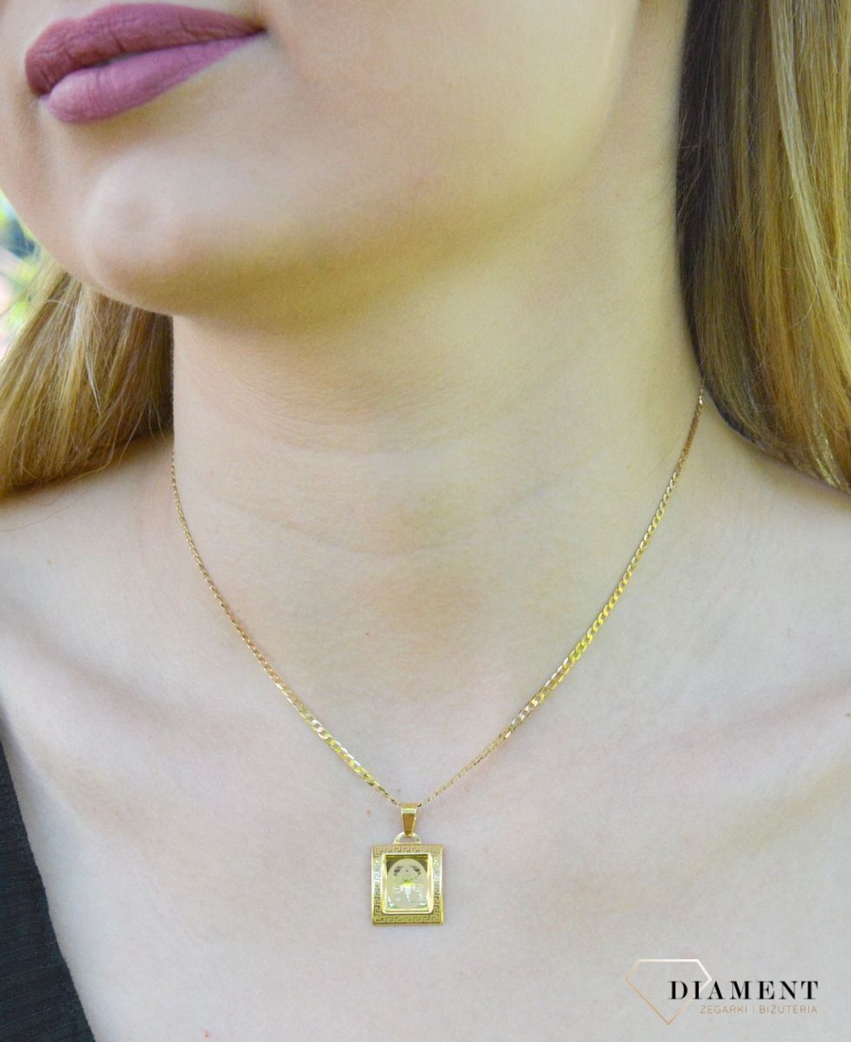 Złota zawieszka 585 znak zodiaku Skorpion DIA-ZAW-9064-585. Zawieszka została wykonana ze złota próby 585.Zawieszka będzie pięknym prezentem dla bliskiej osoby spod znaku skorpion. W naszej ofercie dostępne są także naszyjniki.jpg