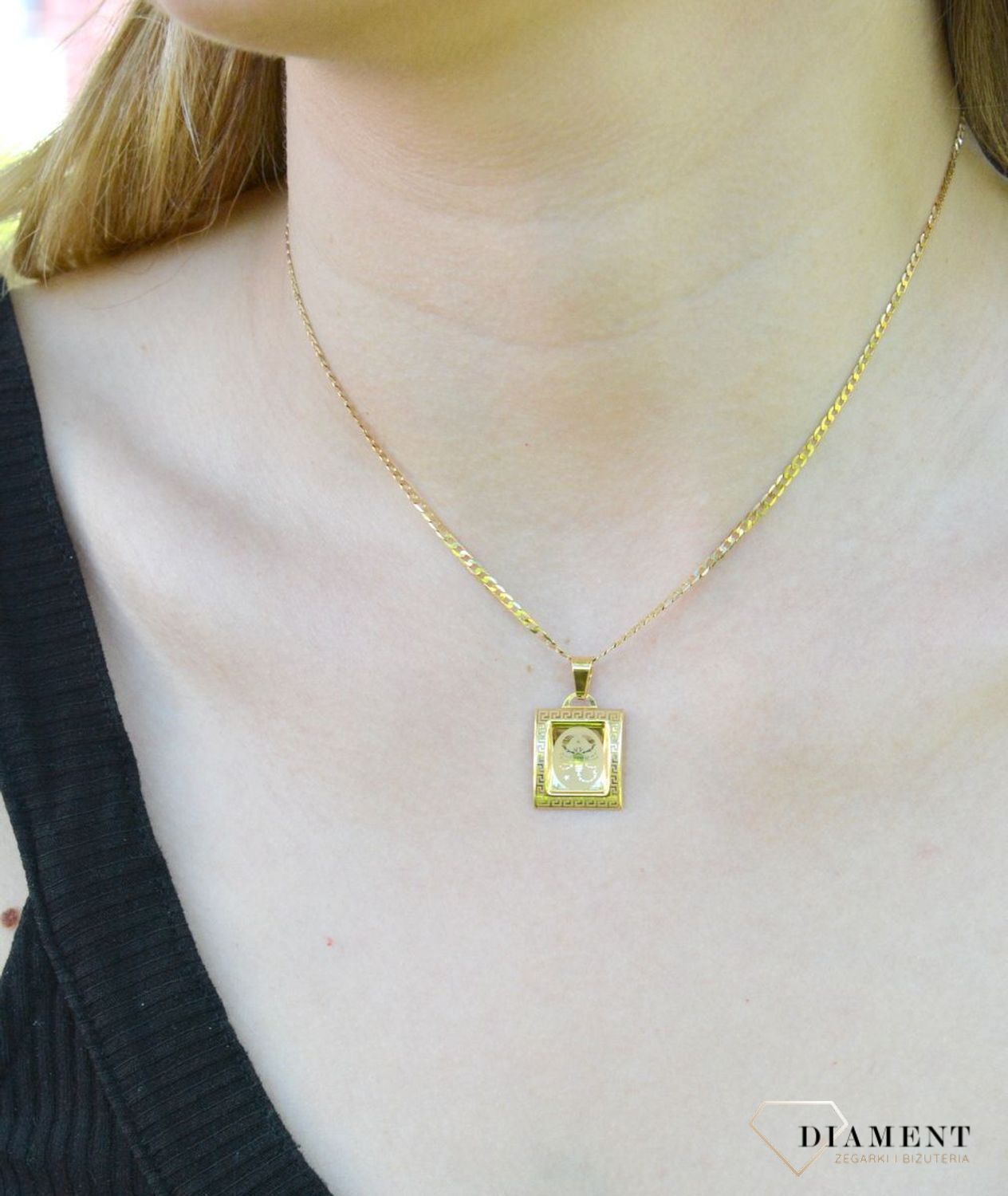 Złota zawieszka 585 znak zodiaku Skorpion DIA-ZAW-9064-585. Zawieszka została wykonana ze złota próby 585.Zawieszka będzie pięknym prezentem dla bliskiej osoby spod znaku skorpion. W naszej ofercie dostępne są także naszyjniki.jpg