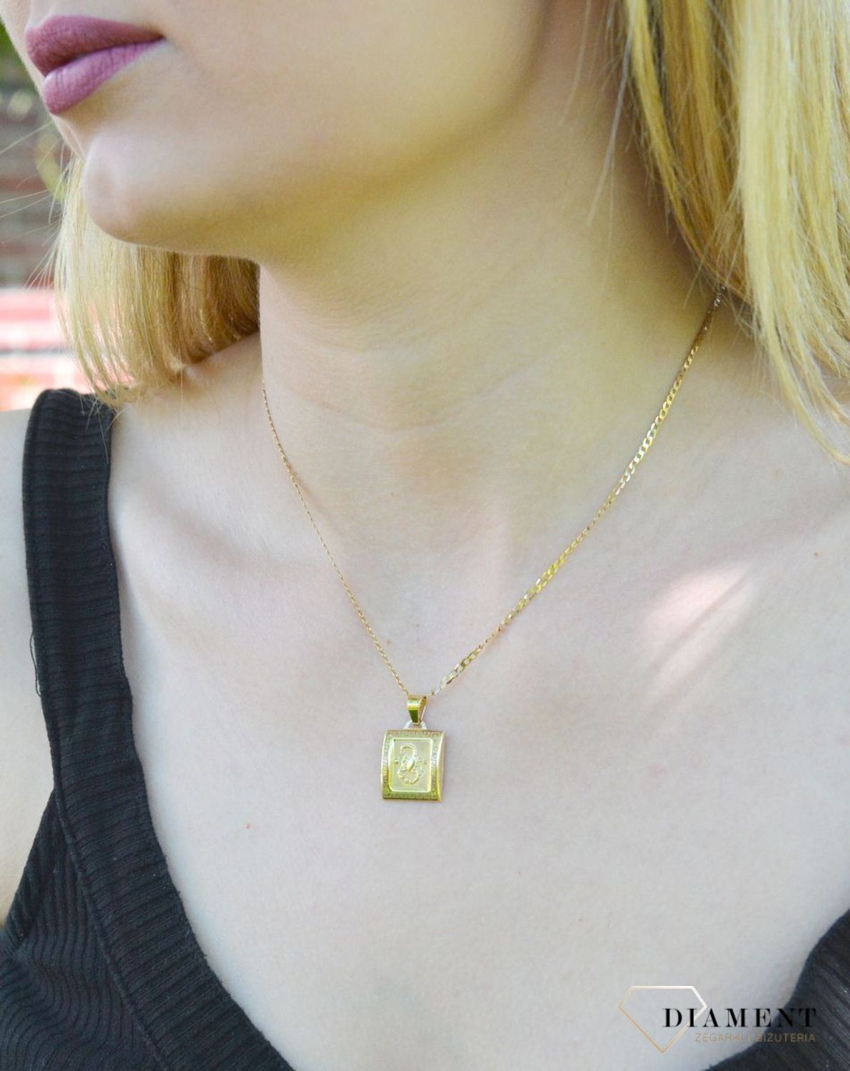 Złota zawieszka 585 znak zodiaku Skorpion DIA-ZAW-9065-585. Zawieszka została wykonana ze złota próby 585.Zawieszka będzie pięknym prezentem dla bliskiej osoby spod znaku skorpion. W naszej ofercie dostępne są także naszyjniki.jpg