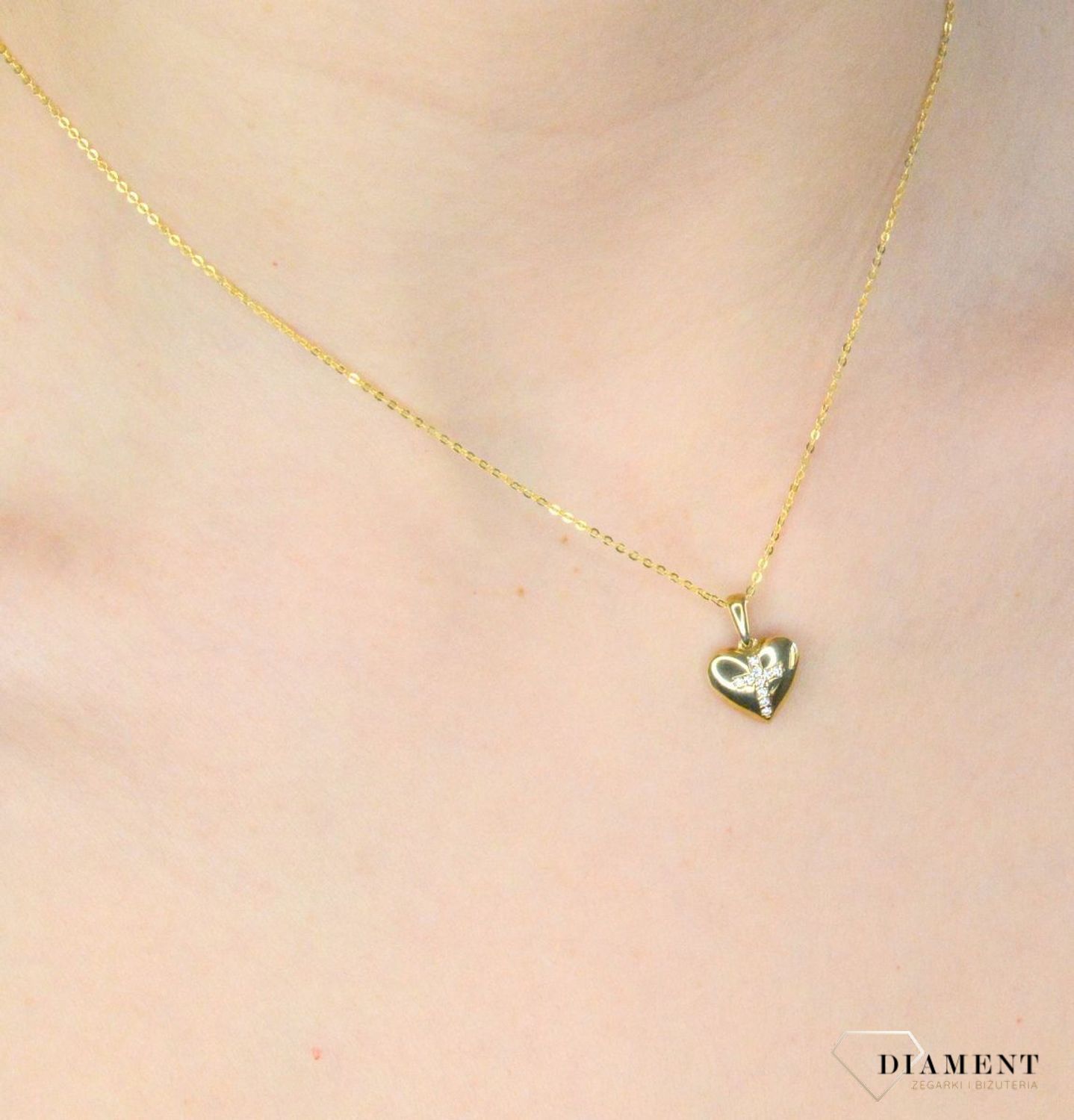 zlota-zawieszka-375-serce-z-krzyzykiem-z-cyrkonii-dia-zaw-9138-375.-zawieszka-w-ksztalcie-serca-z-krzyzykiem-bedzie-wspaniala-pamiatka-i-prezentem-z-okazji-chrztu-komunii-czy-bierzmowania.-zawieszka-wykonana-.jpg
