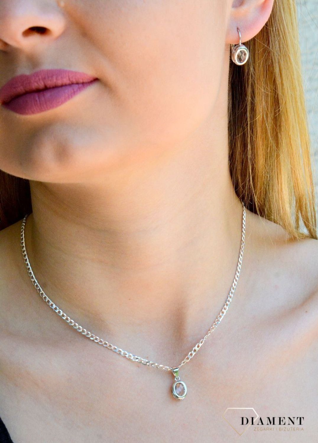Srebrna zawieszka damska owalna z białą cyrkonią DIA-ZAW-9426-925d.jpg