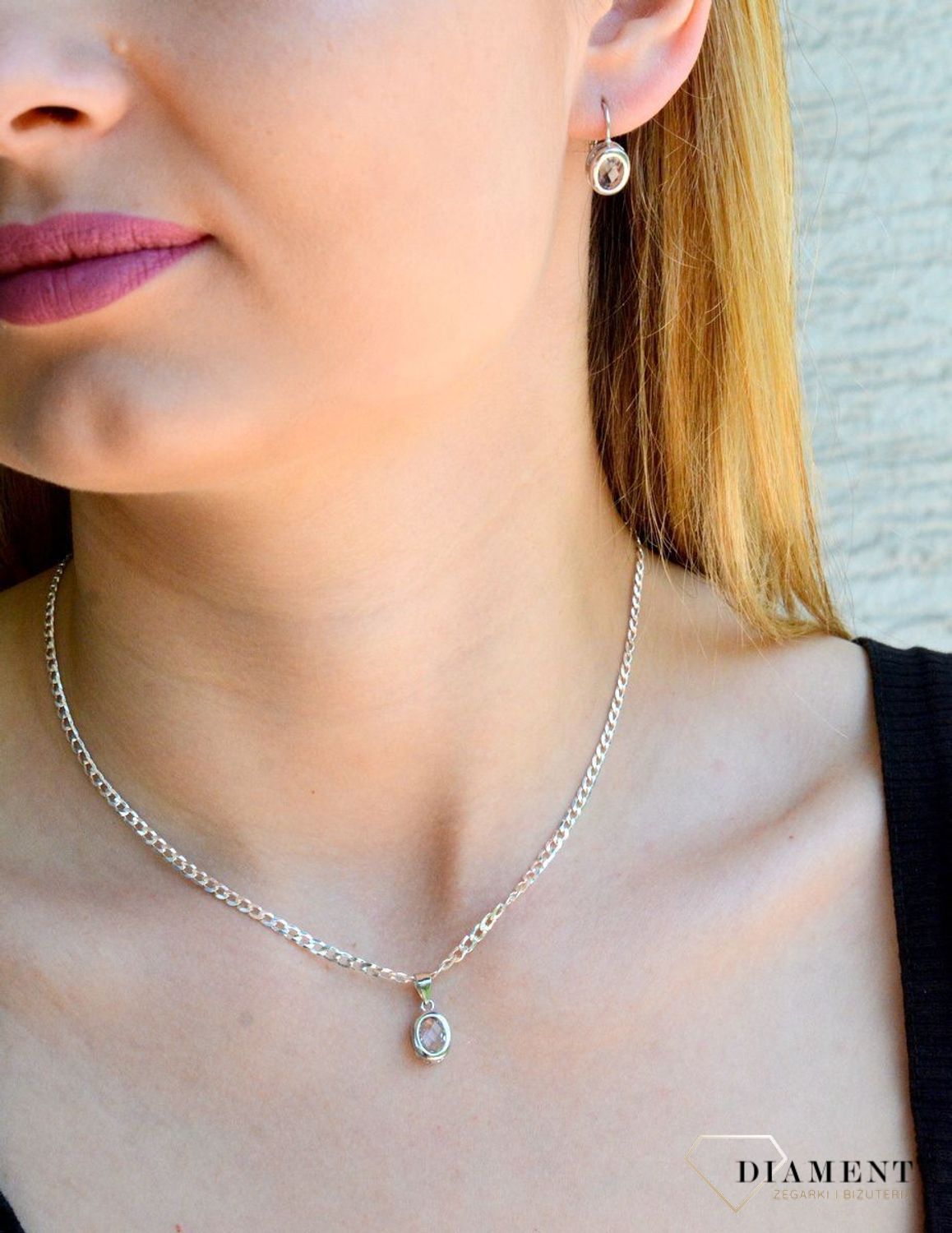 Srebrna zawieszka damska owalna z białą cyrkonią DIA-ZAW-9426-925d.jpg