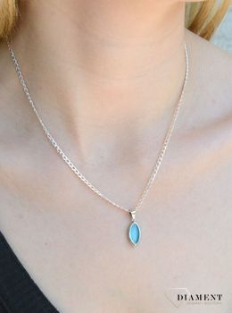 Srebrna zawieszka z turkusową cyrkonią DIA-ZAW-9427-925. Zawieszka jest więc idealna dla kobiet ceniących sobie nowoczesny i elegancki styl. Zawieszka została wykonana z najwyższej jakości srebra próby 925 Idealna na pre.JPG