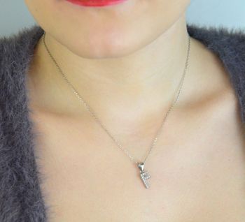 Zawieszka srebrna 925 DIA-ZAW-LITERKA-F2-925 – literka F zdobiona cyrkoniami. Wymiary 1,7x0,7 cm, waga 0,65 g. Subtelna, elegancka biżuteria z przesłaniem – idealna na prezent (3).JPG