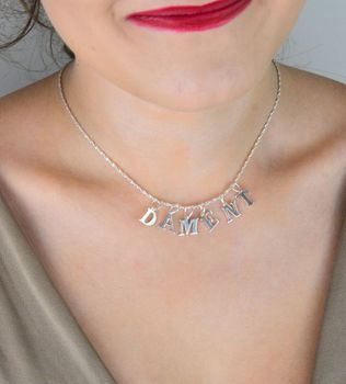 Zawieszka damska ze srebra 925 w kształcie litery T. Długość 1,5 cm, waga 0,38 g. Stylowa, symboliczna i idealna do personalizowanej biżuterii (2).JPG