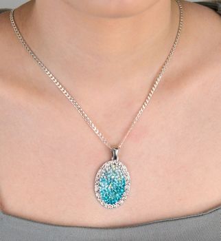 Zawieszka damska srebrna próba 925, owalna z niebieskimi cyrkoniami DIA-ZAW-SWAROVSKI-66-925. Wyjątkowa zawieszka srebrna w owalnym kształcie, ozdobiona niebieskimi cyrkoniami, wykonana z wysokiej jakości sr (4).JPG