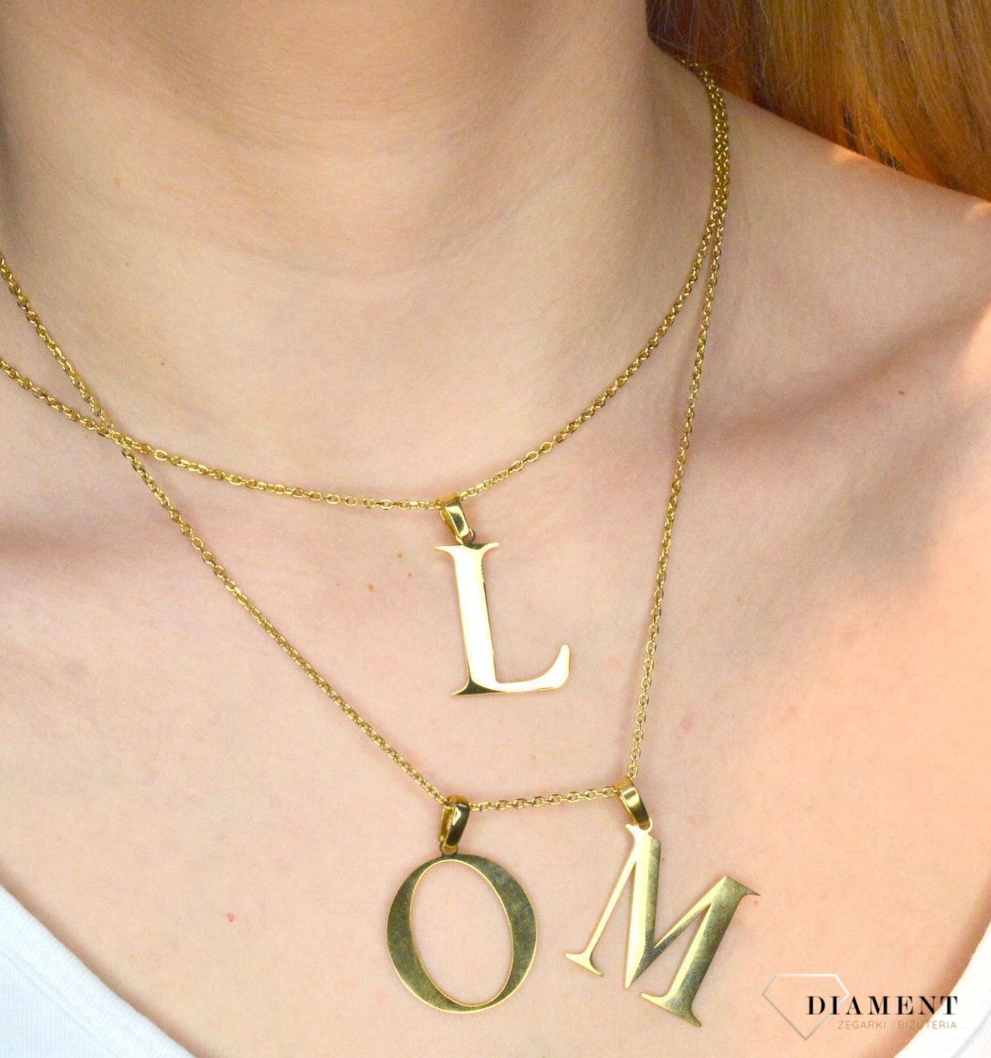 Stalowa zawieszka pozłacana Literka L 2,5 cm DIA-ZAW-ZL10819-STAL..JPEG