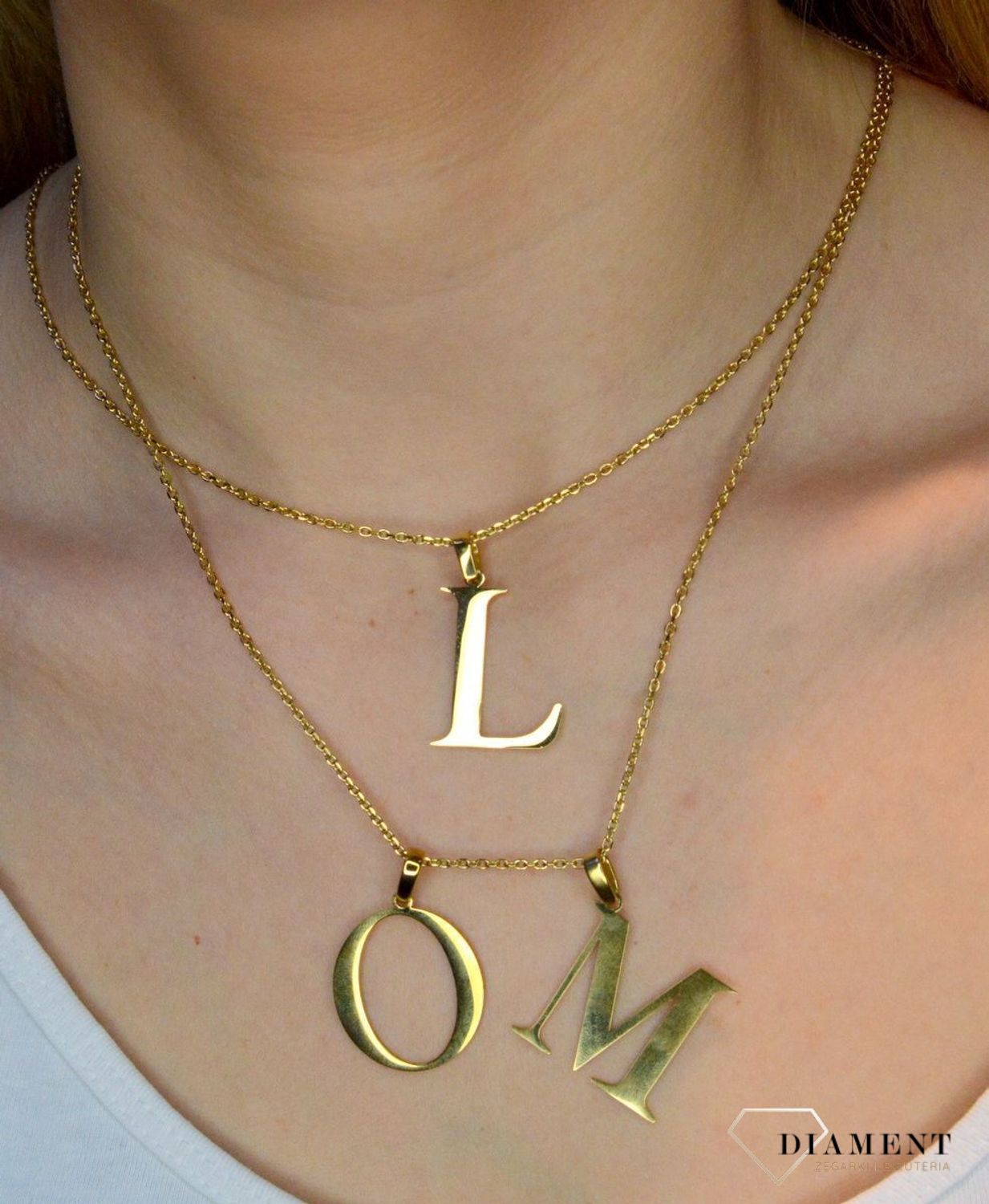 Stalowa zawieszka pozłacana Literka L 2,5 cm DIA-ZAW-ZL10819-STAL..JPEG