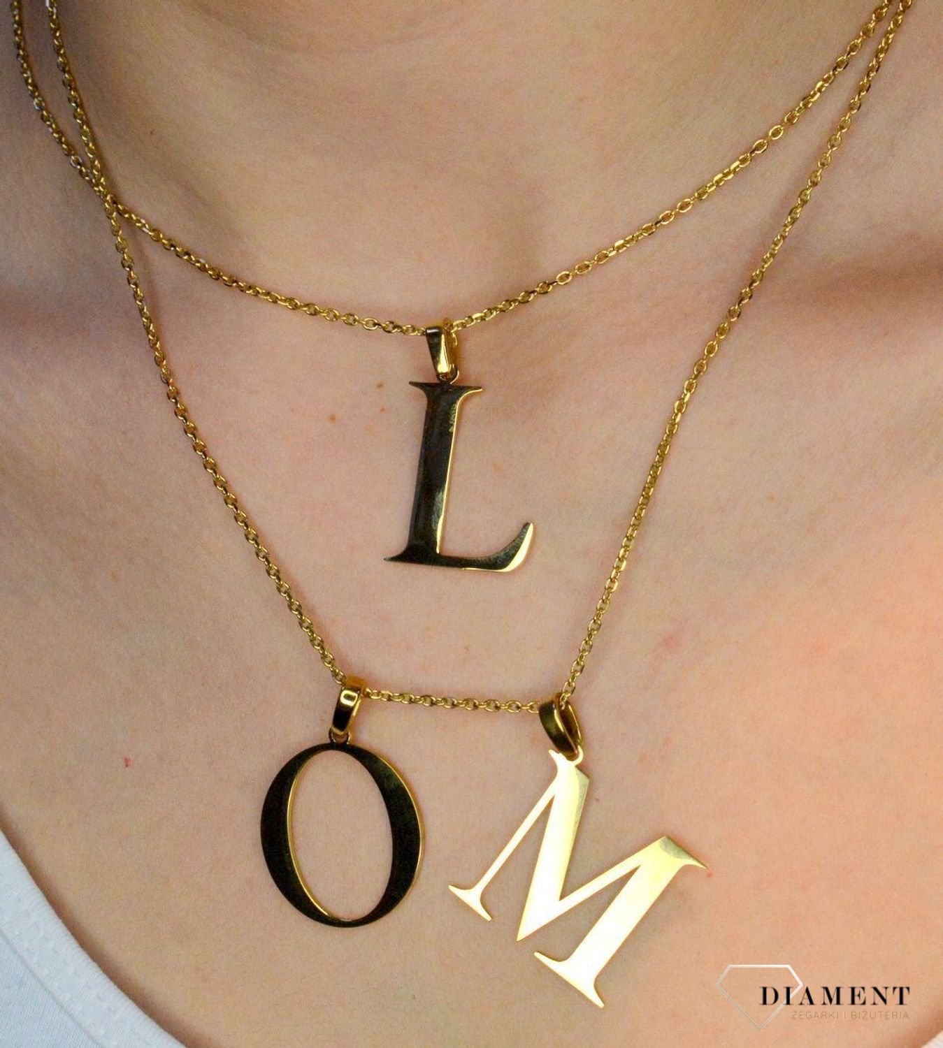 Stalowa zawieszka pozłacana Literka O 2,5 cm DIA-ZAW-ZO10819-STALc.jpg