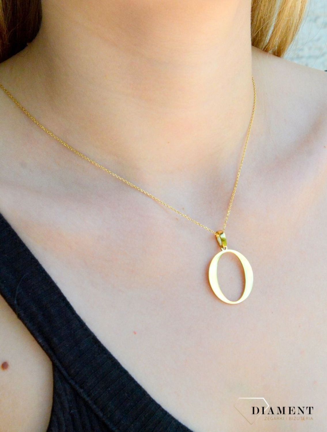 Stalowa zawieszka pozłacana Literka O 2,5 cm DIA-ZAW-ZO10819-STALc.jpg